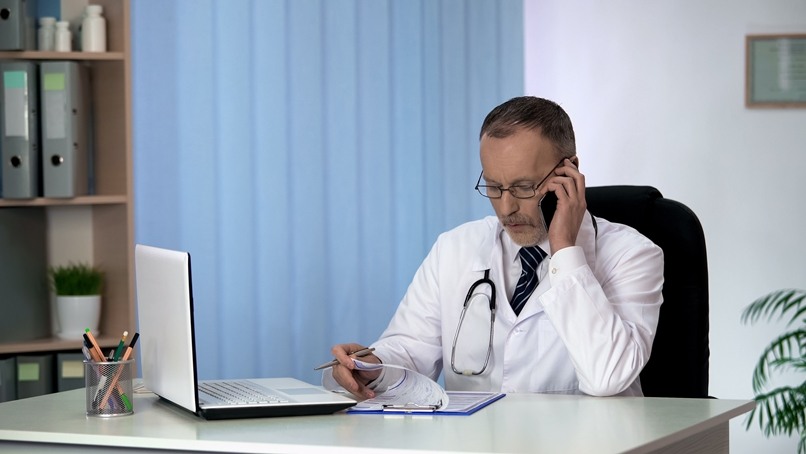 doctor consulting patient phone conversation professiona 1